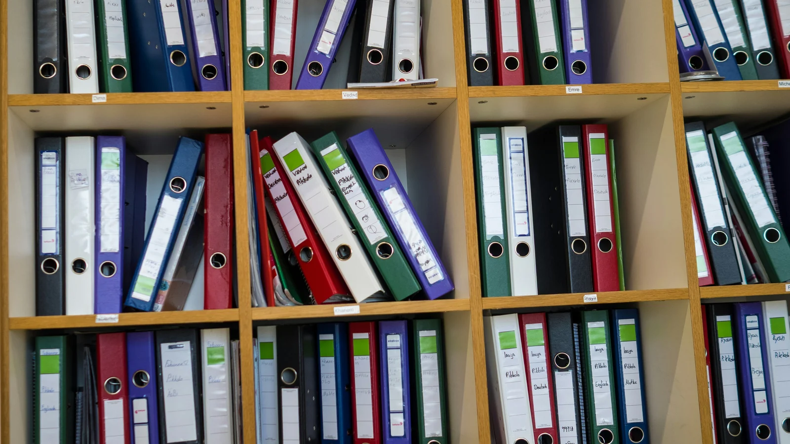 Shelves of binders and folders in an office archive room